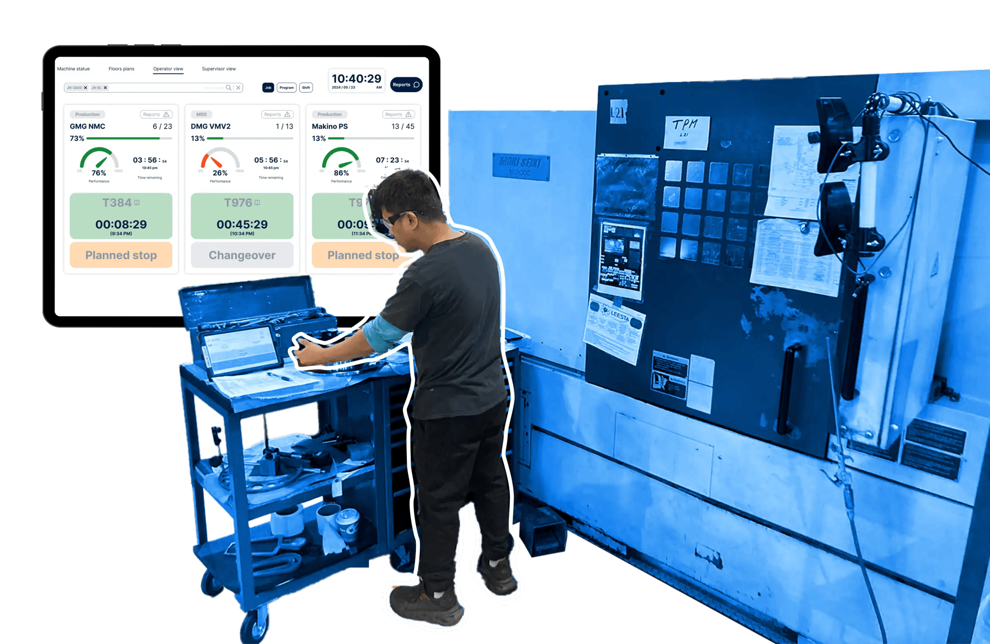 Operator working on a CNC machine with JITbase displayed on a tablet